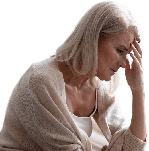 a depressed mature woman sitting touch her forehead in misery 