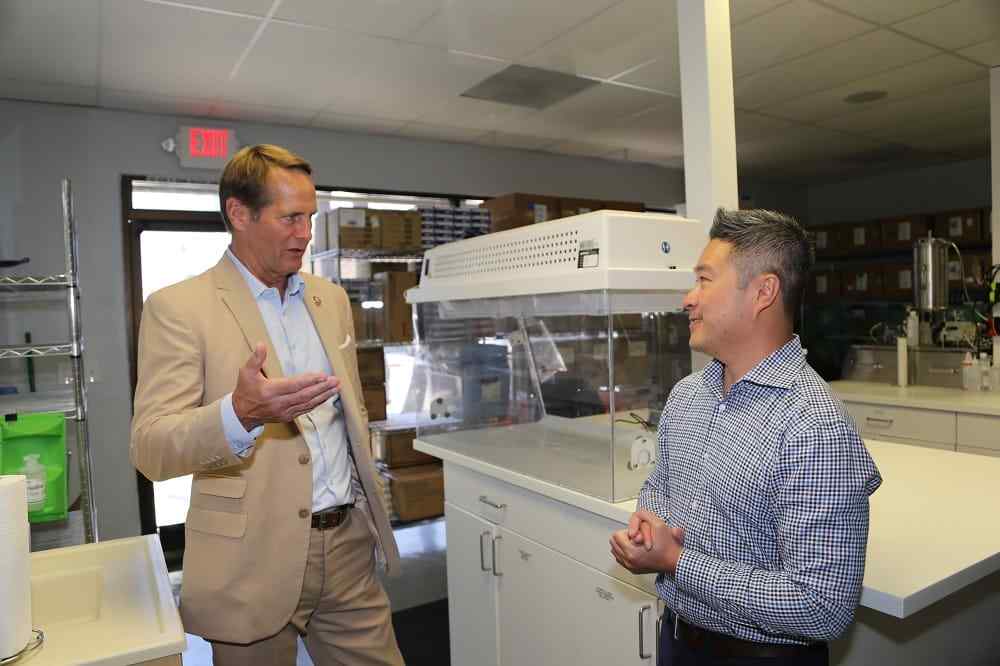 Congressman Rouda at harbor compounding pharmacy with Mike Hua