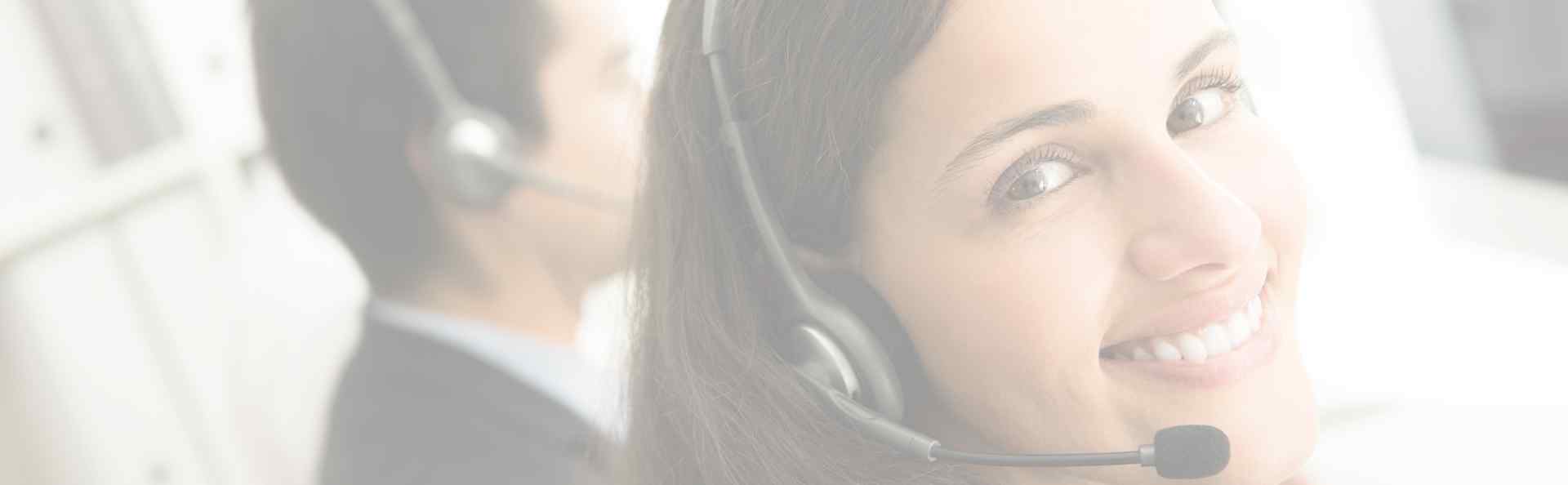 a happy customer services girl wearing headset responding to customers