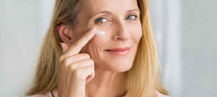 a happy women using estrogen to rejuvenate her skin